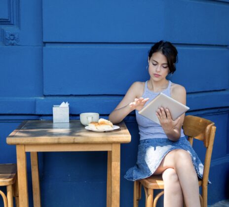 Young woman paying with alternative online payment methods