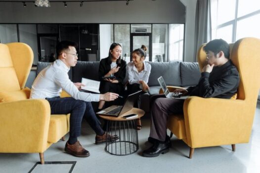 professionals having a meeting on couches