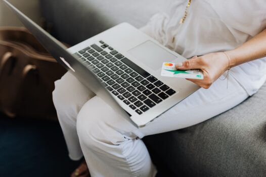 woman uses credit card for ecommerce