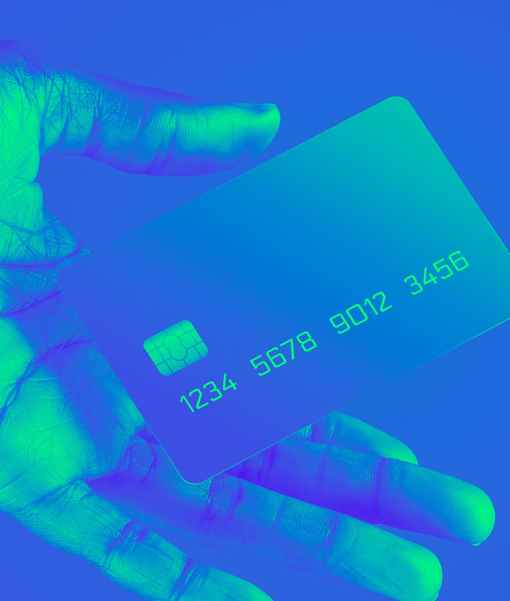 Close up of hand holding a credit card