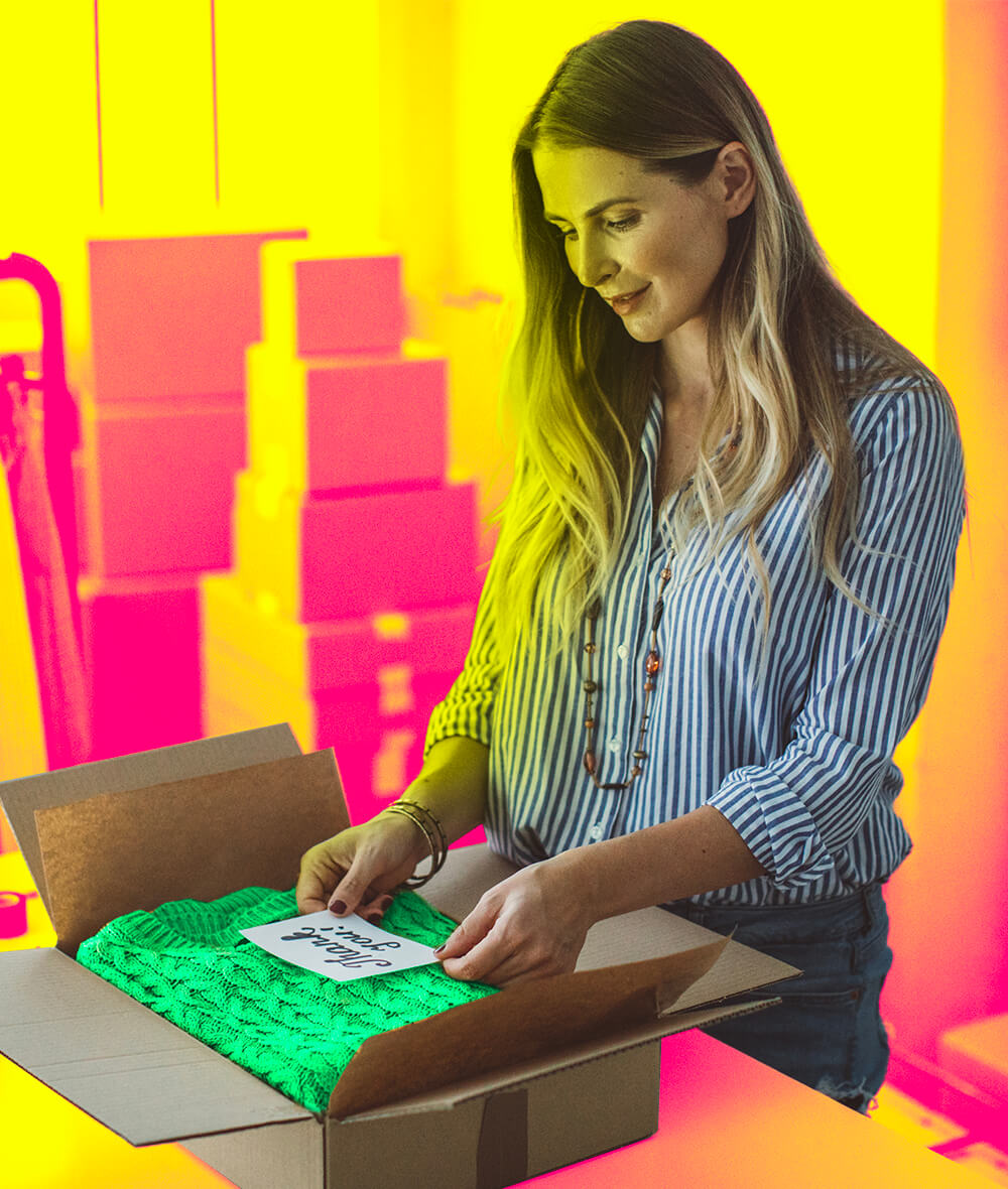 A woman is looking at the text in the box